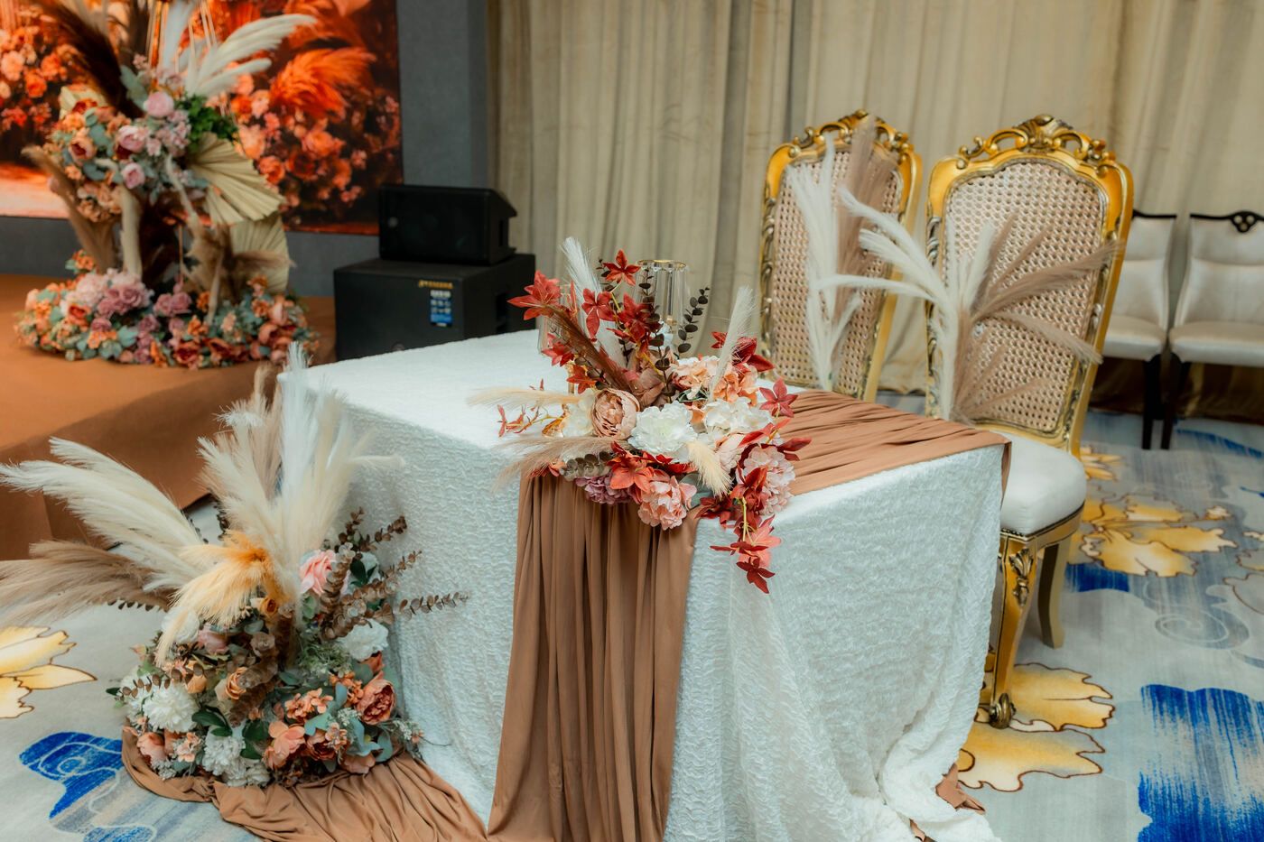 Decorated stage and seating from the event room